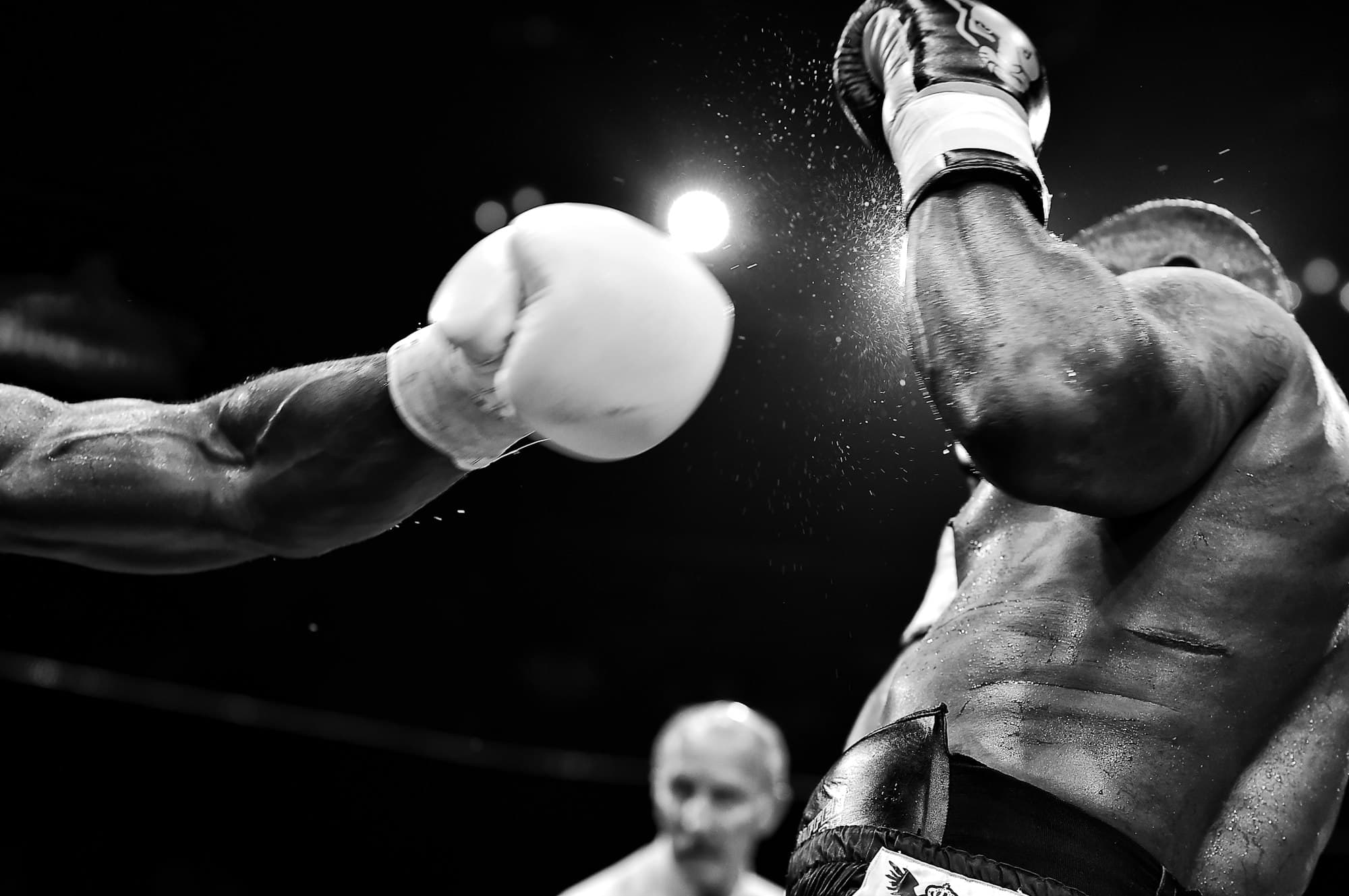 Man getting hit in boxing match