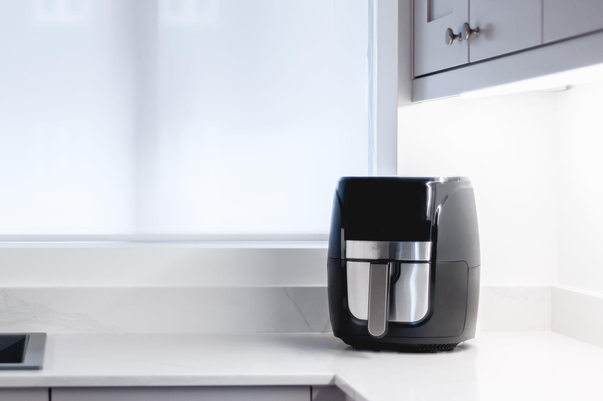 Air fryer sitting on a countertop.