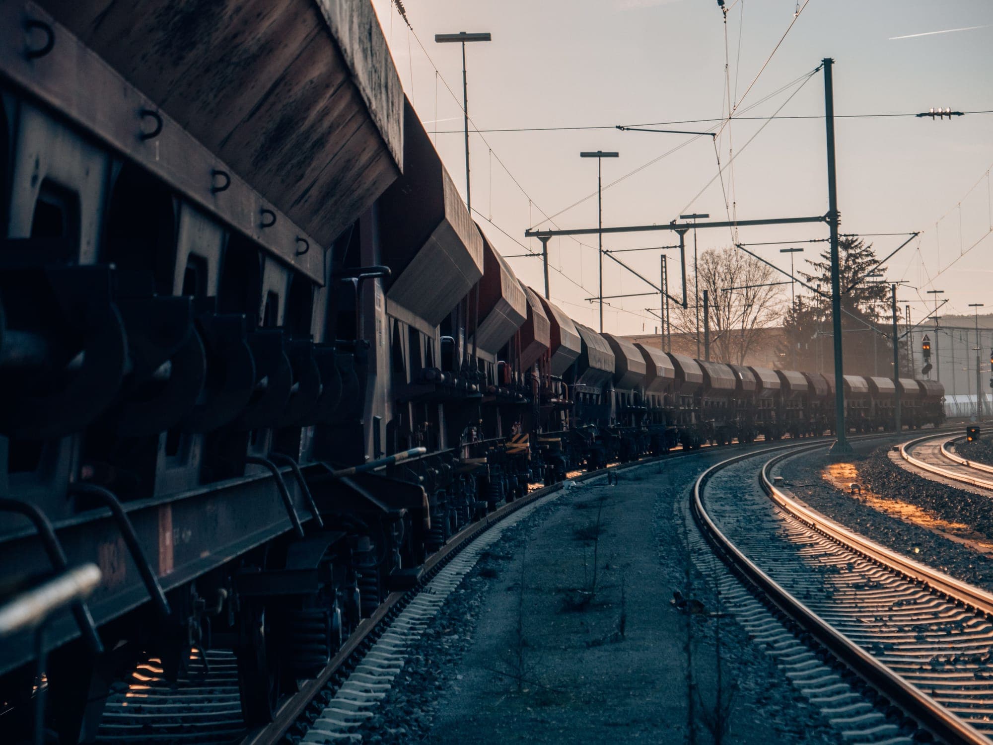 Cargo train rolling down the tracks.